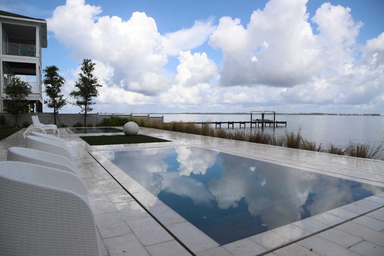 Pool Builders in Cleveland, TN 5 Backyard gunite pool and patio by Southern Poolscapes