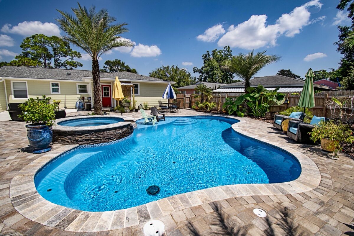 Can you recommend unique and modern pool shapes? 9 Perdido Beach Pool Builders 4
